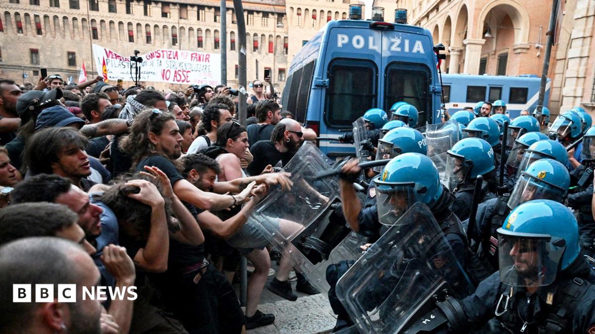 Italy protests: Dozens hurt in Bologna after man dies while being restrained by police